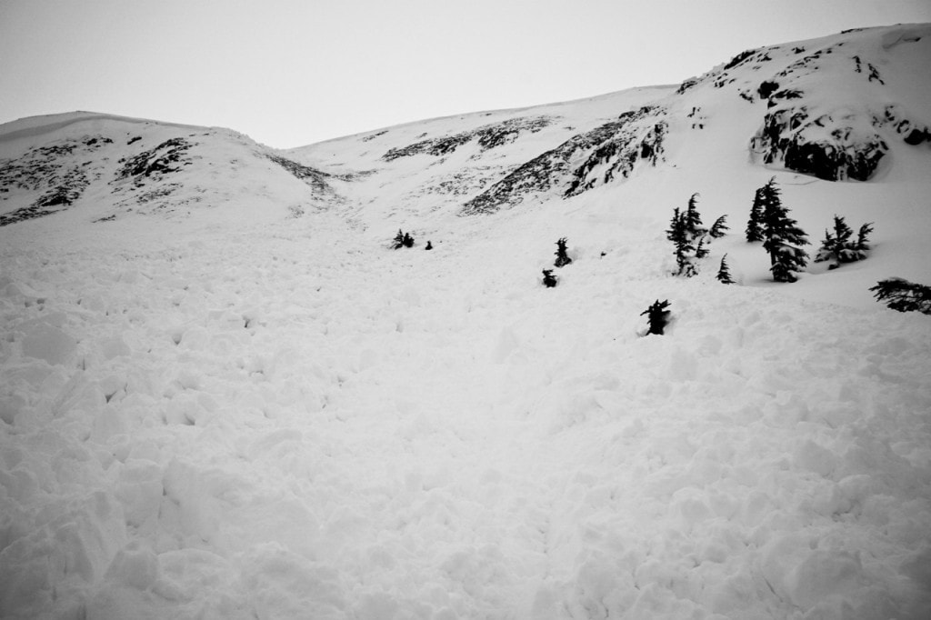 Looking up slide path from a mid-slope bench, likely location of riders when caught. Credit: CNFAIC
