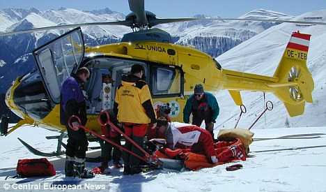 The scene on piste as patrol and medical workers assess a fatal accident. Photo: Daily Mail