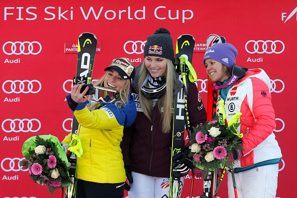 Swiss Lara Gut (left) takes a selfie on the podium with Lindsey Vonn and Germany’s Viktoria Rebensburg. (Getty Images/Agency Zoom-Stanko Gruden)