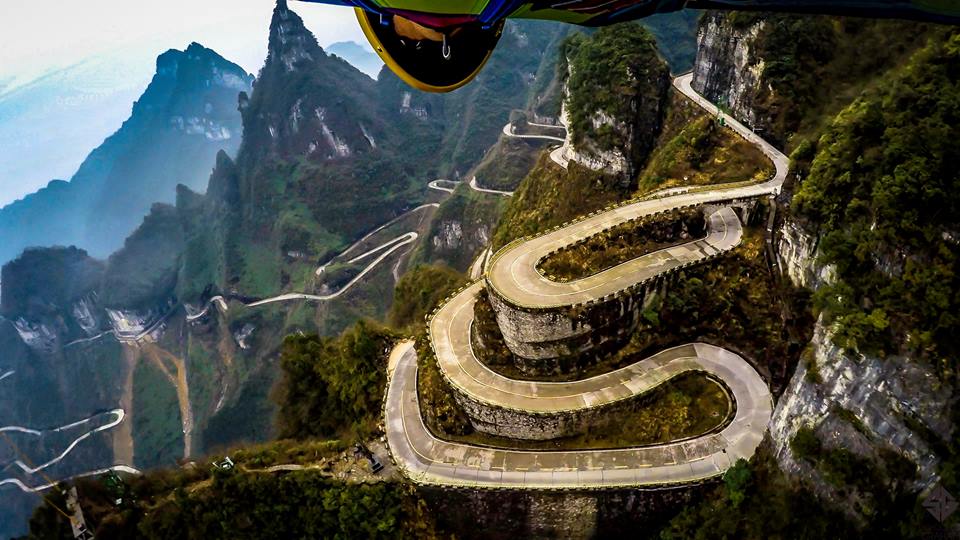 Chest mounted GoPro photo while Graham Dickinson flies over some mountain roads in China. Source; Graham Dickinson Official Facebook Page.