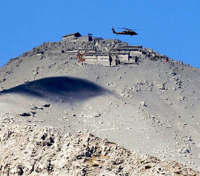 Mountain lodge buried in ash after eruption on Mt. Ontake. photo: kimmasa mayama/epa