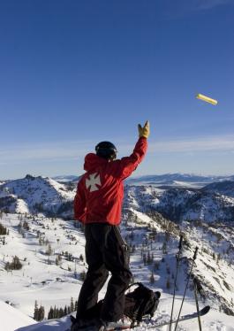 Squaw Patroller throwing avalanche bomb. Squaw throws more avalanche bombs than any other ski resort on Earth.