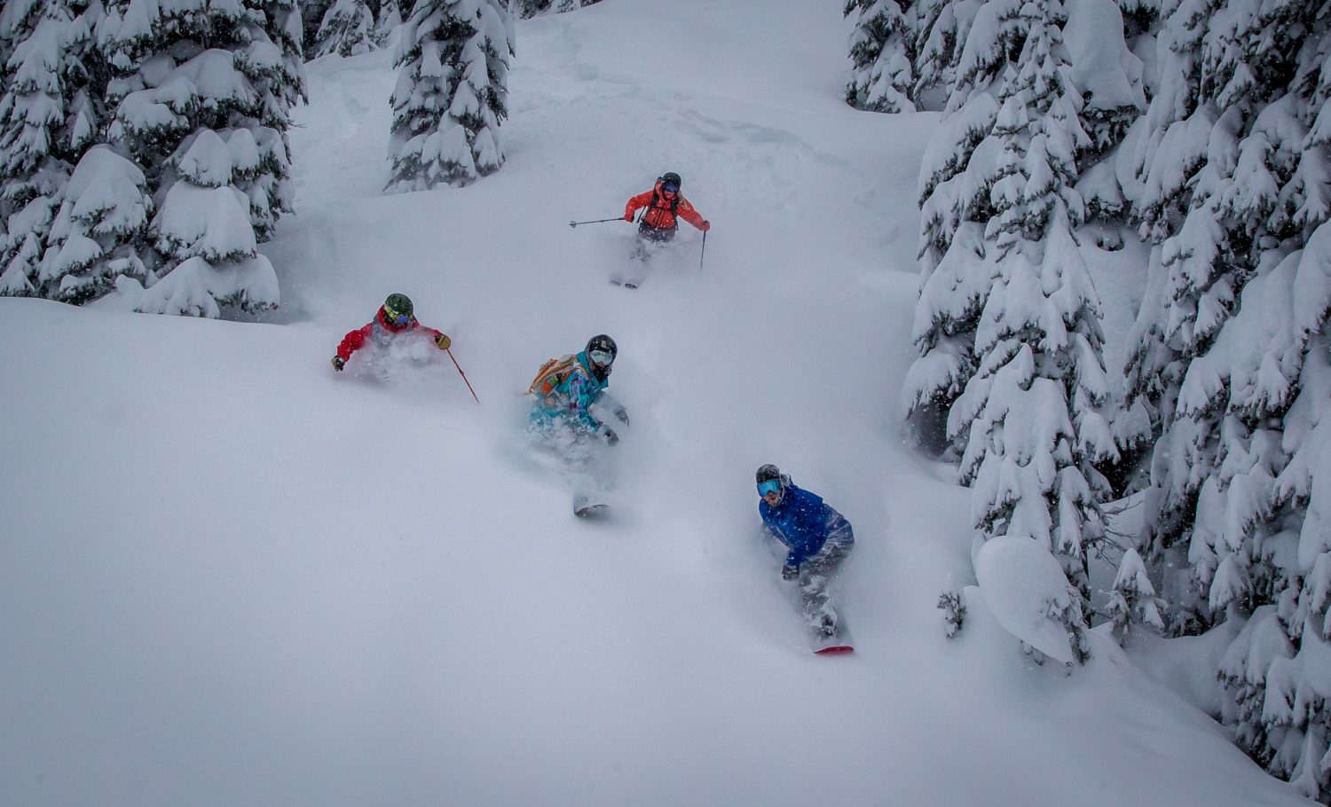 Snowboarders and Skiers finding face shots on the same run