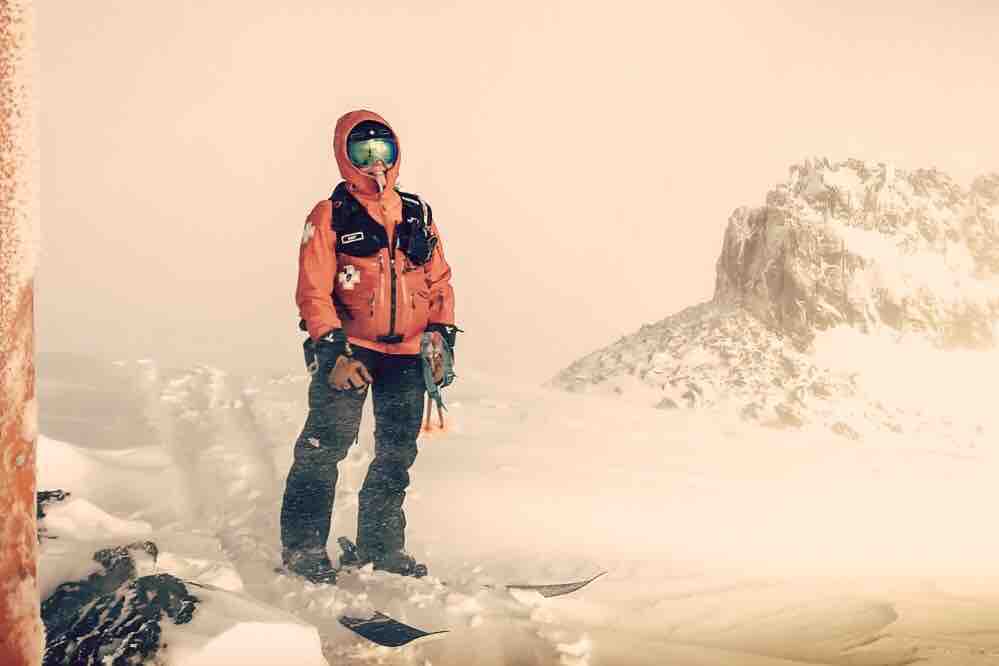 Amy in ski patrol uniform up on emigrant ridge