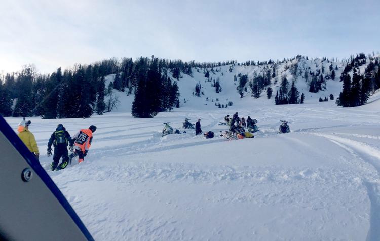 avalanche, wyoming, snowmobiler