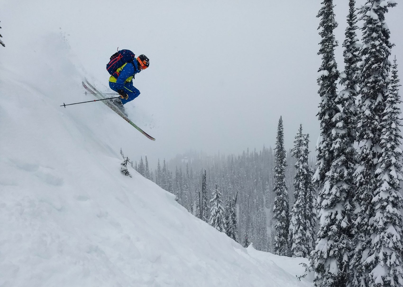 skier jumping in revelstoke