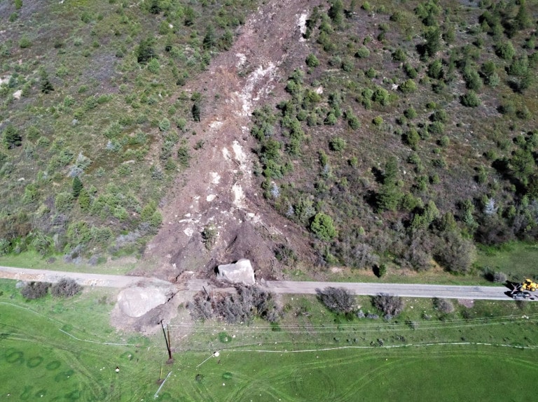 boulders, highway, building sized