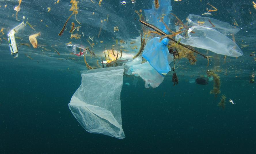 Plastic Ocean Pollution Plastic Bag And Rubbish Floating In Ocean Opt