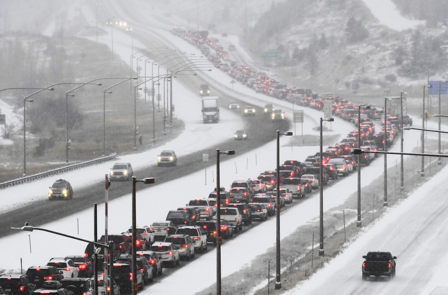 Traffic on Interstate 70 from Denver. Delays from weather and big surge of travelers 