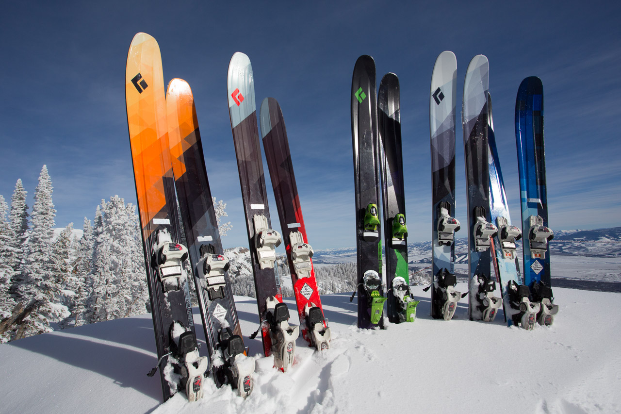 Black Diamond skis all lined up.