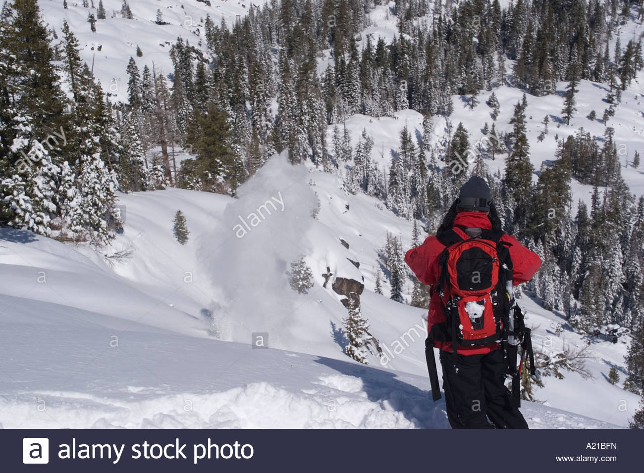 Ski patrol blasting for avalanches. 
