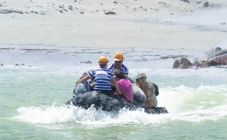 Tourist boats shuttling survivors. 