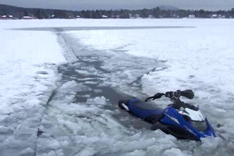 fire, survive, rescue, snowmobilers, frozen lake, montana