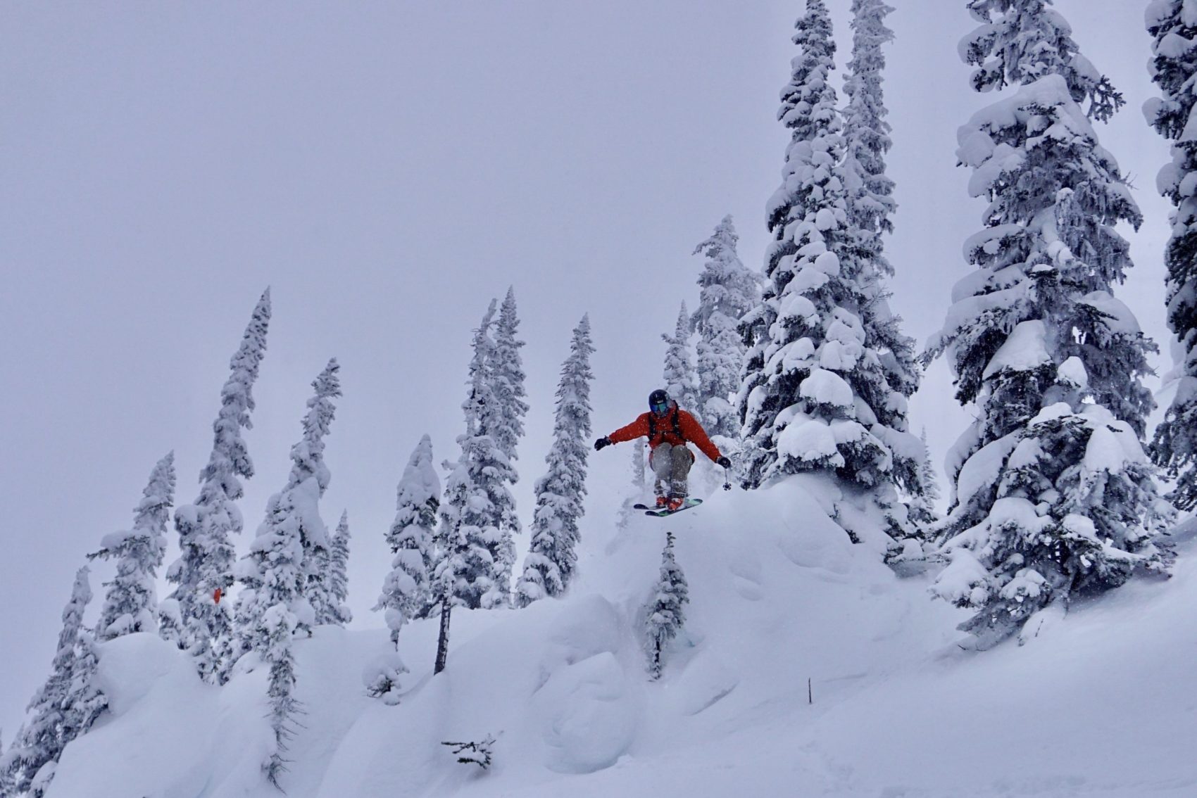 Skier jumping off pillow