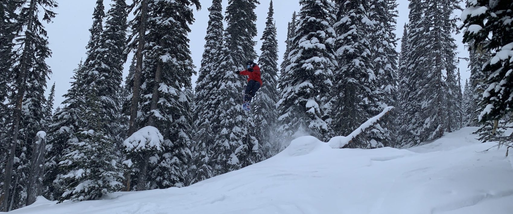 Skier jumping in Revelstoke