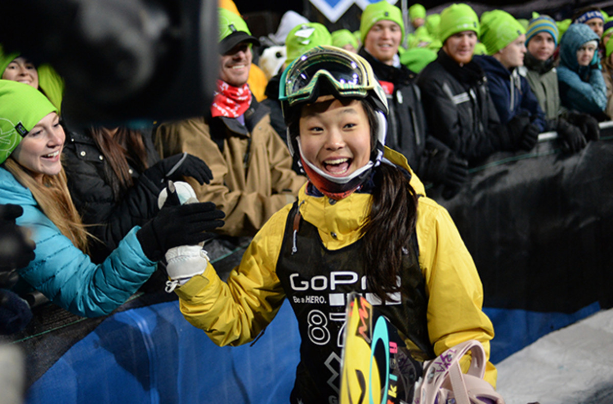 Chloe Kim getting high five from fan