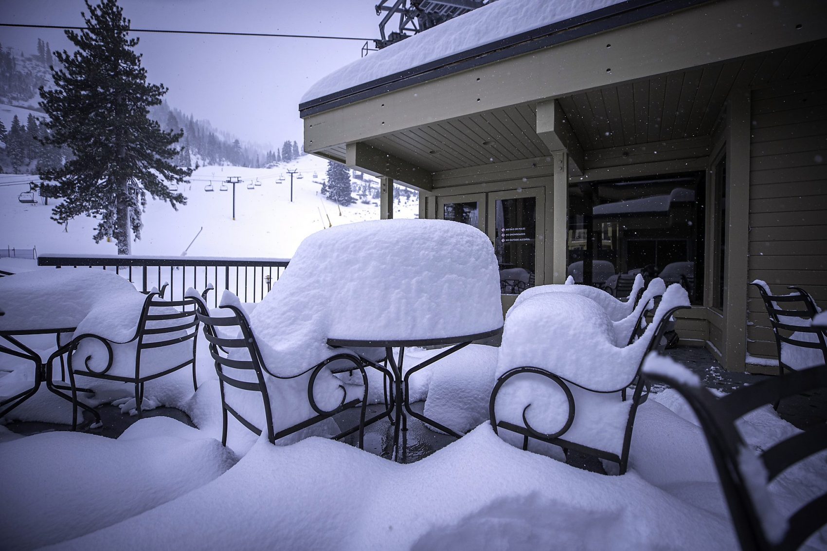 Feet of snow on tables, california, 