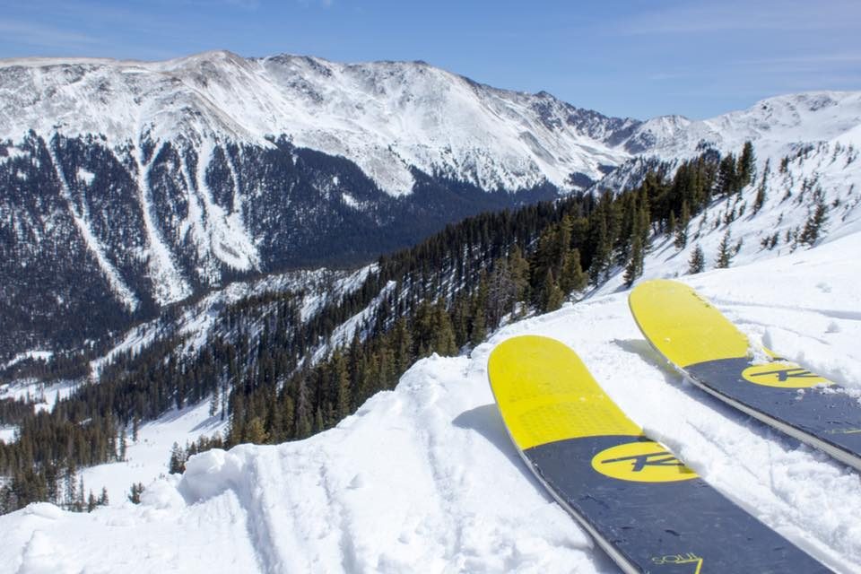 Skier overlooking valley