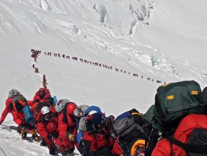 Line of climbers on their ascent of Everest