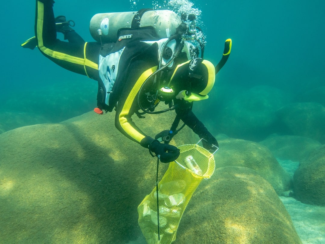 Diver cleaning up, Lake Tahoe trash