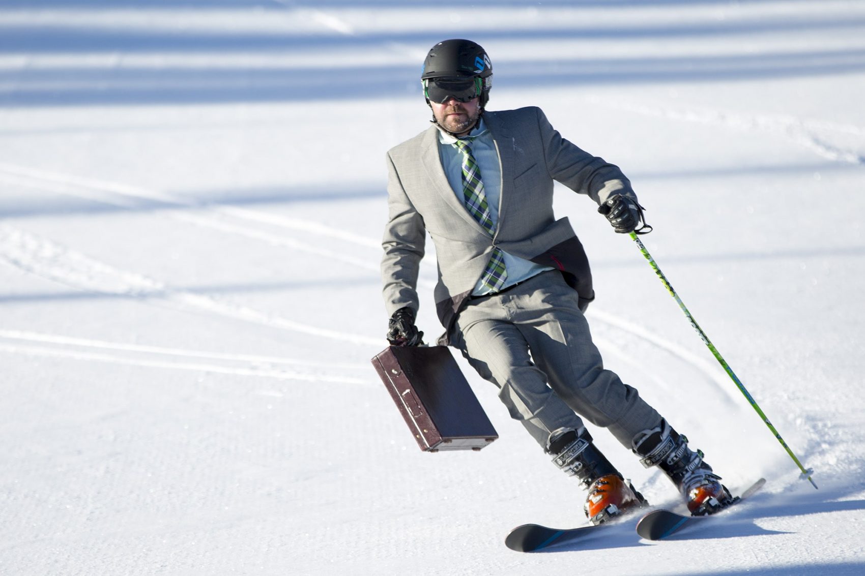 Business man skiing, vail resorts financial