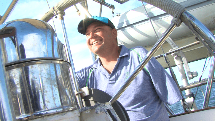 Reynolds steering his vessel. 