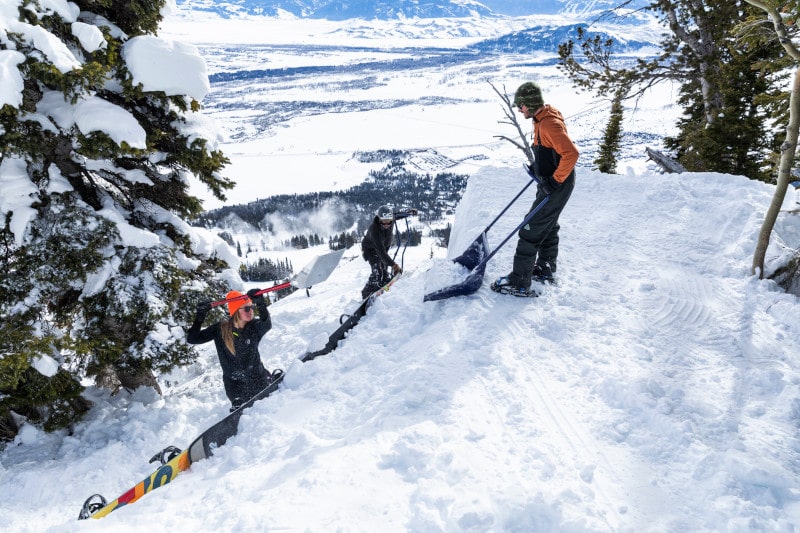 Builders helping with construction of features on Moran's face, Jackson Hole, WY. 