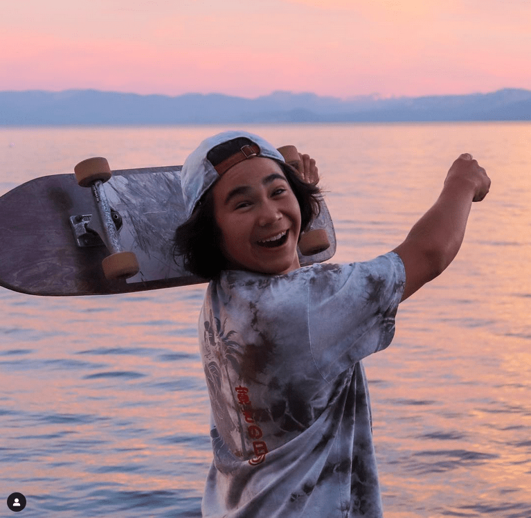 Tavo enjoying his board and another gorgeous Lake Tahoe sunset. 