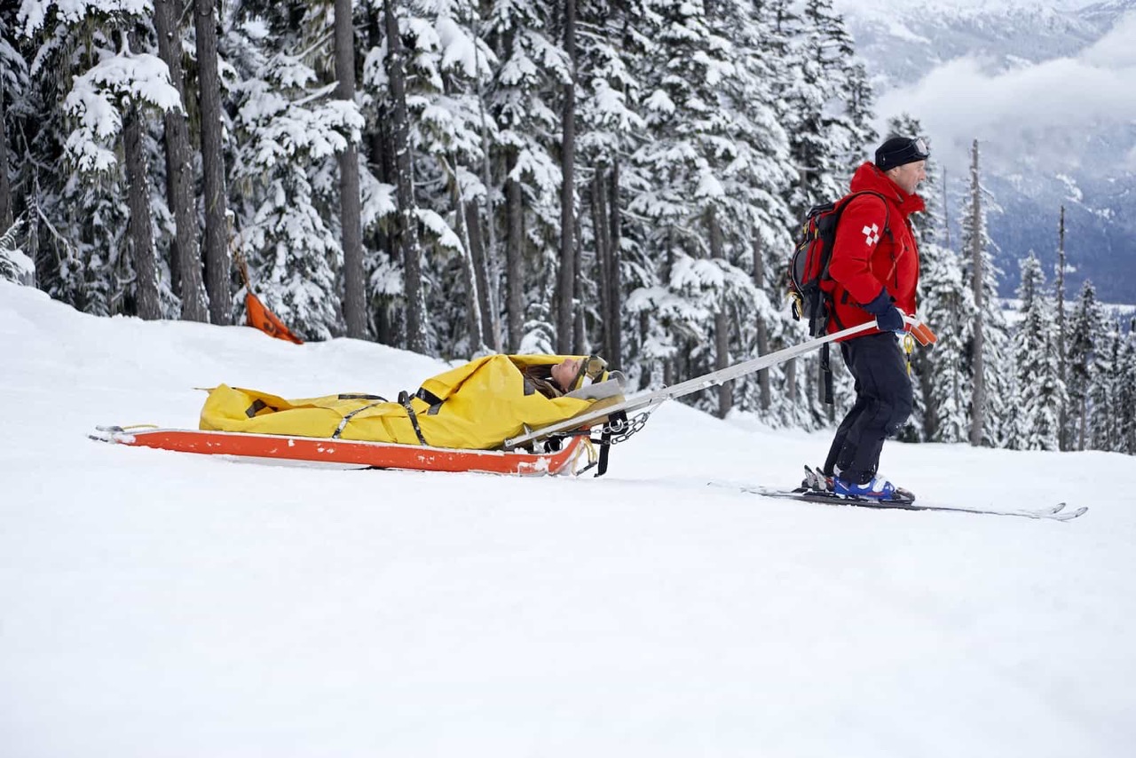 Patroller pulling a toboggan. Credit: Getty Images