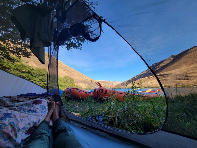 Finding some shade and much earned relaxation along the Snake River. Photo Credit: Tributary Whitewater