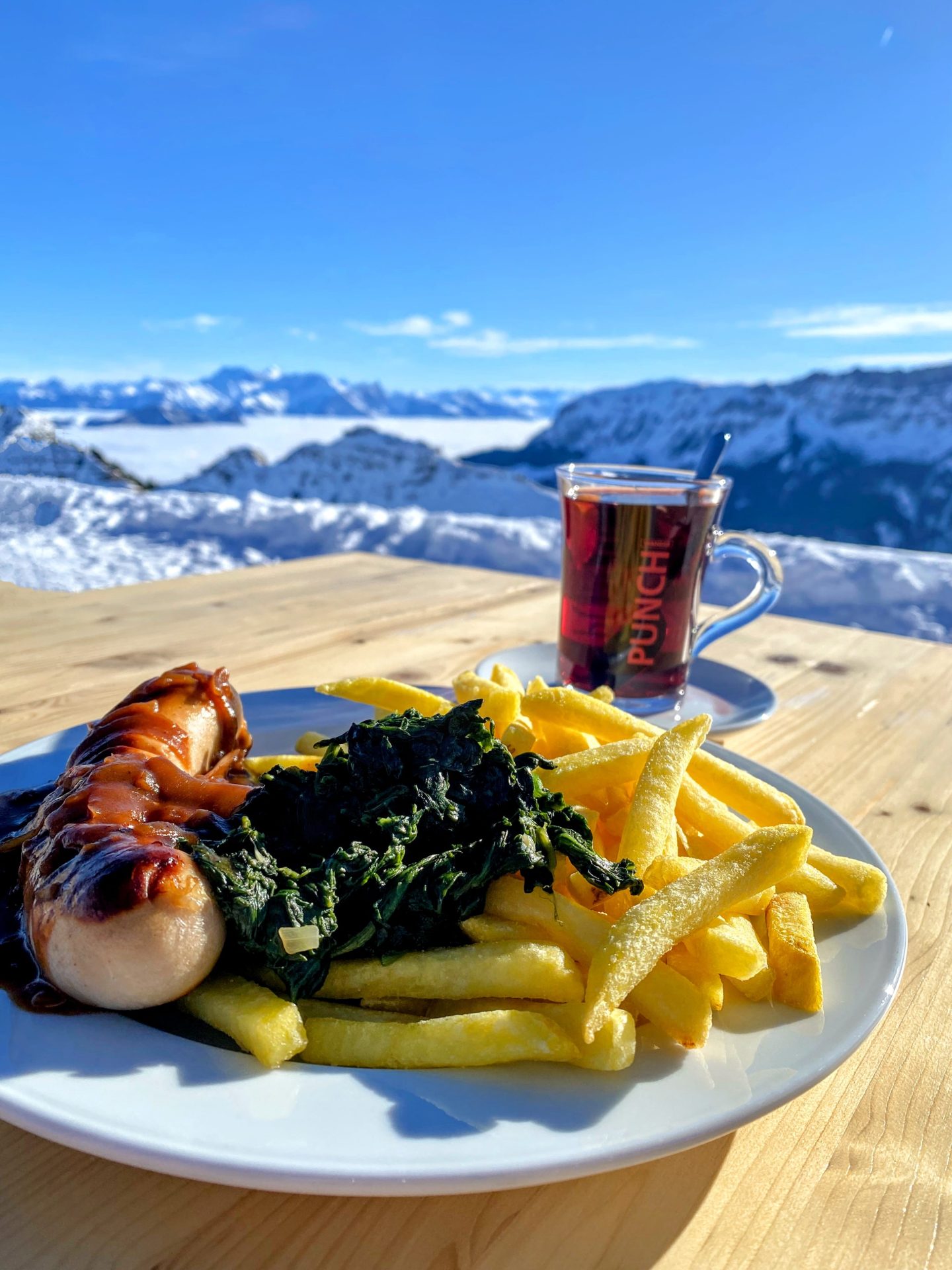 Gluwein, sausage, and fries in Switzerland