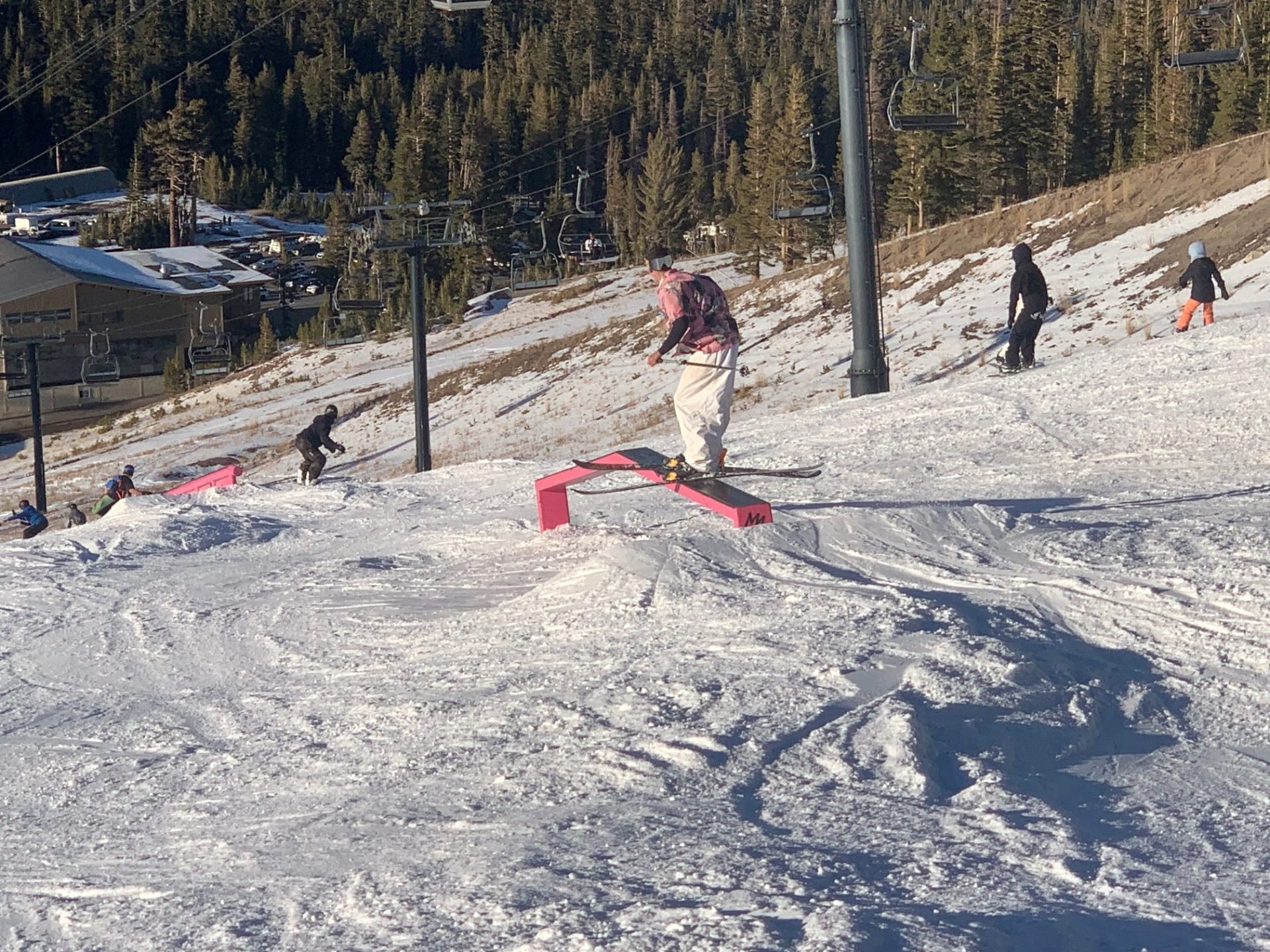 Skier slides an up down rail at Mammoth, CA.