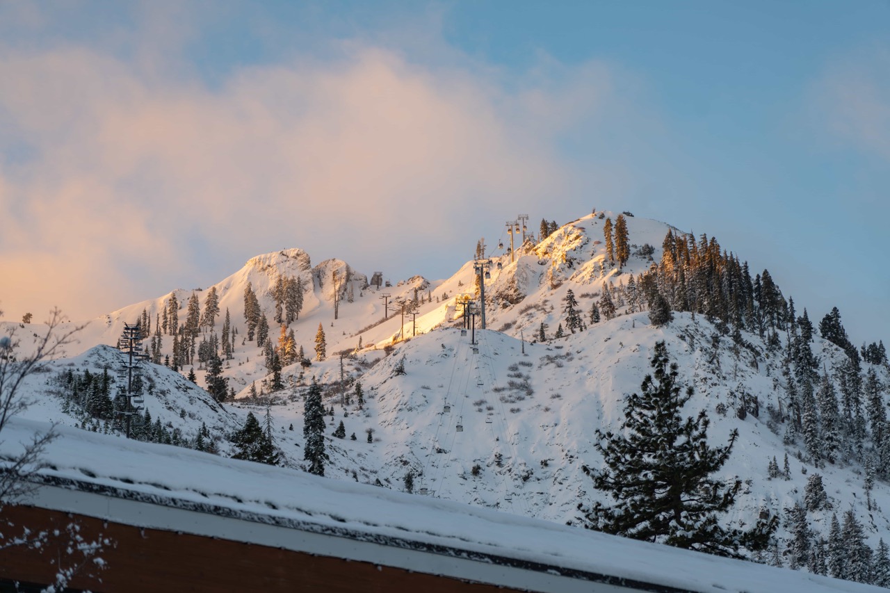 fresh snow on the mountain at Palisades Tahoe california blue skies