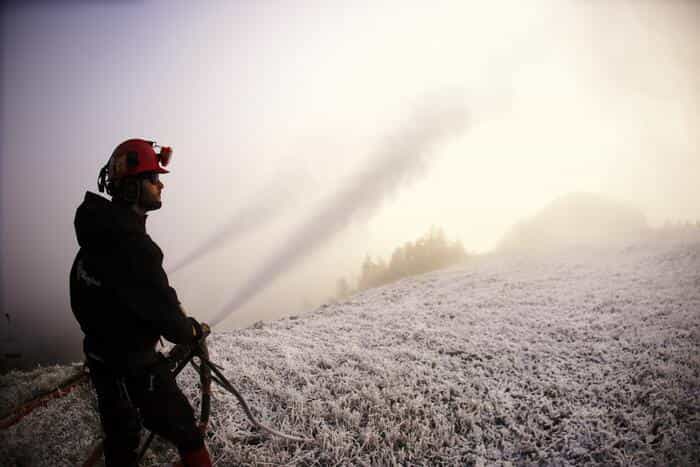 man snowmaking at a vermont ski area