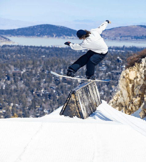 Snowboarder front board at Bear Mountain, CA.