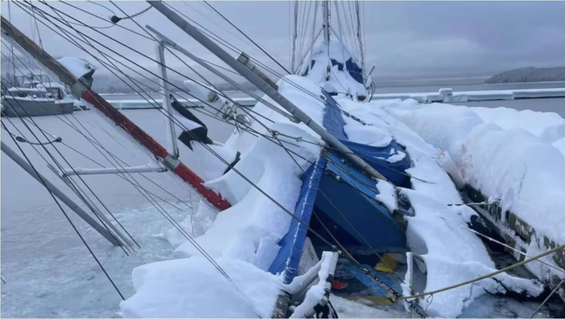Heavy snowfall causes boat to sink