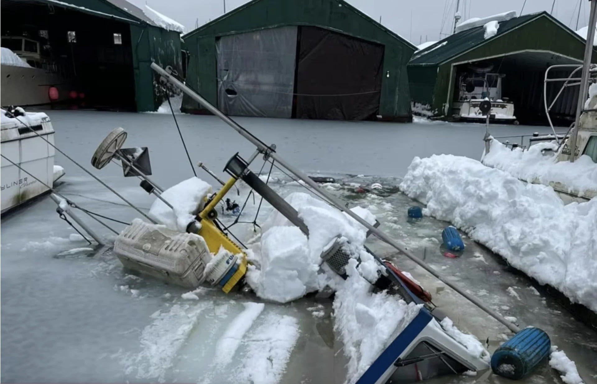 Sunken boat caused by snowfall