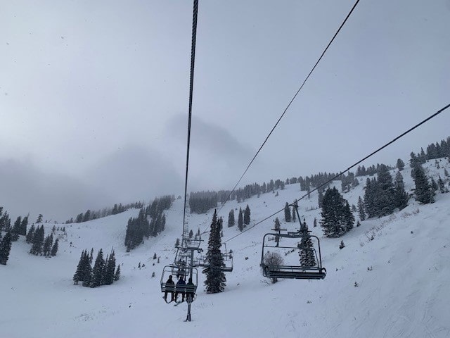 chairlift and clouds
