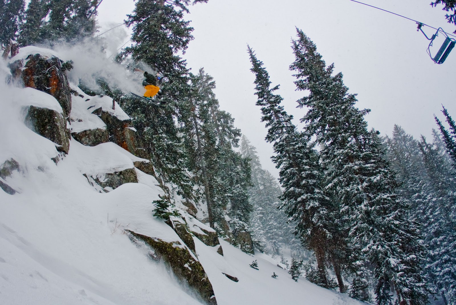 The infamous Hollywood Cliff under the Crest Express at Brighton Ski Resort. Photo Credit: New Schoolers
