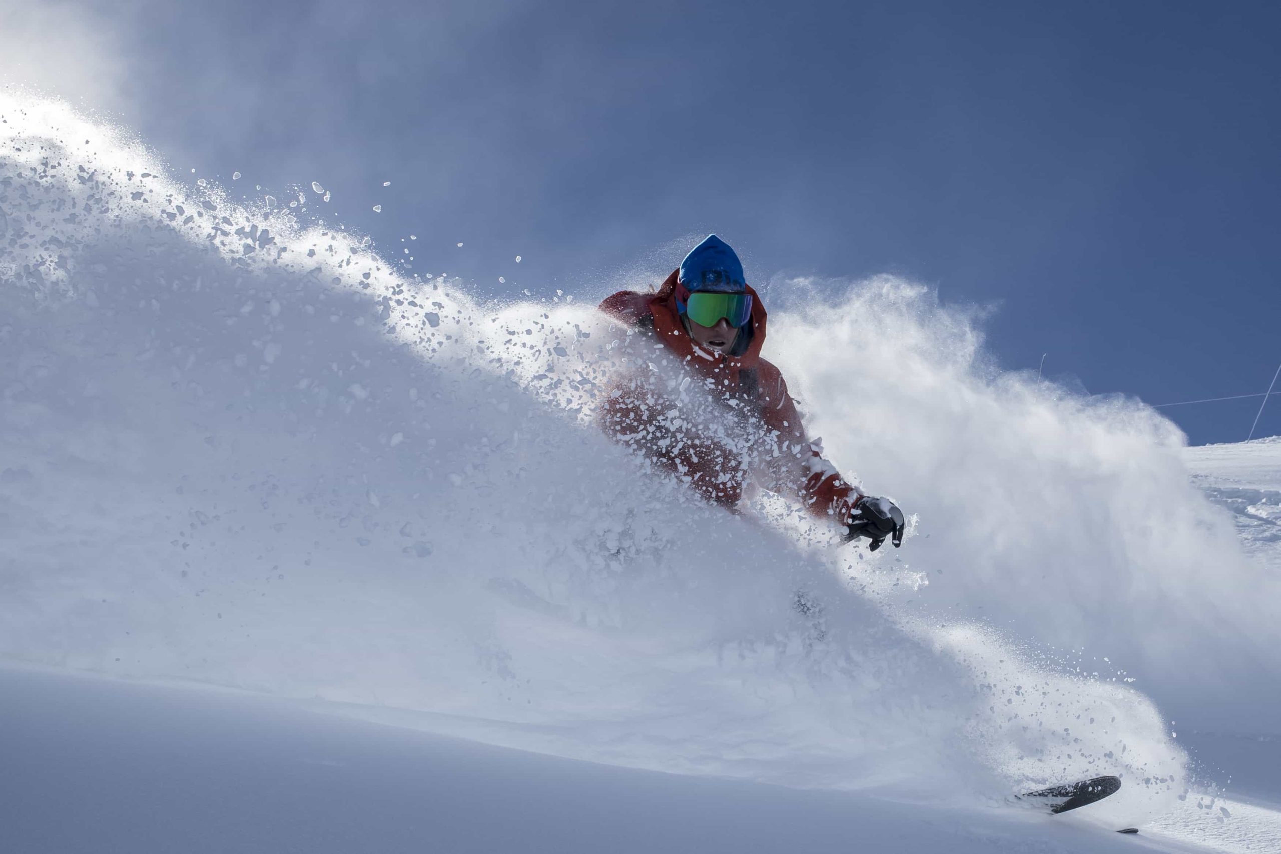 skier in deep powder on snowy slope at Valle Nevada in Chile