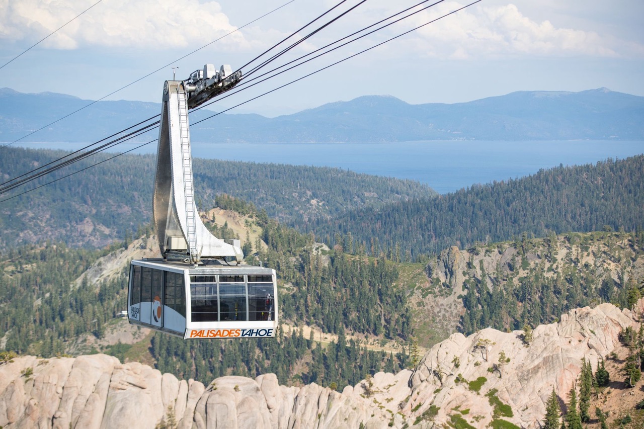 palisades tahoe aerial tram in the summer with lake tahoe in the background