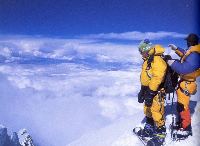 Snowboarder getting ready to descend Mount Everest