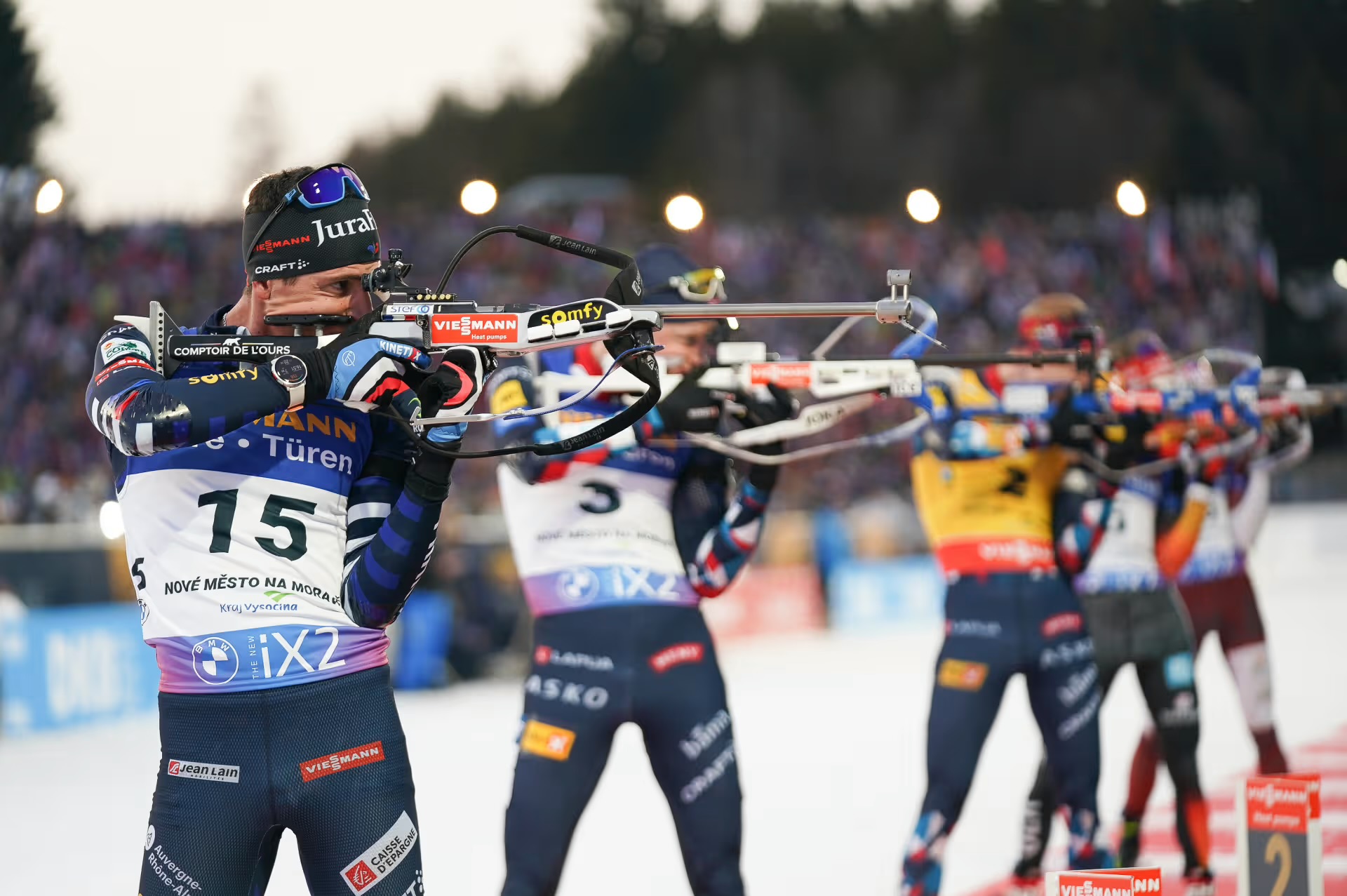 Biathletes in a shooting range