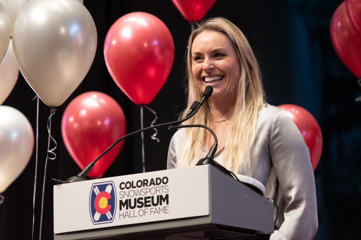 Lindsey Vonn smiles at the podium during her induction speech. 