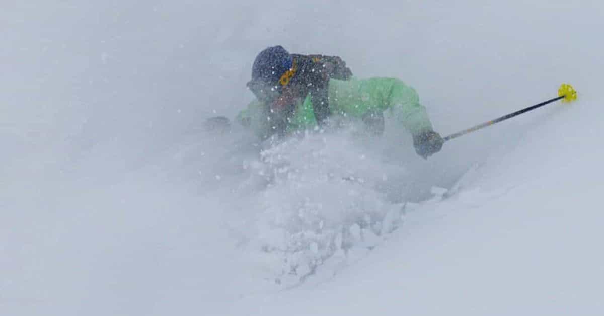 first turns of the season at Silverton Mountain skier in deep snow