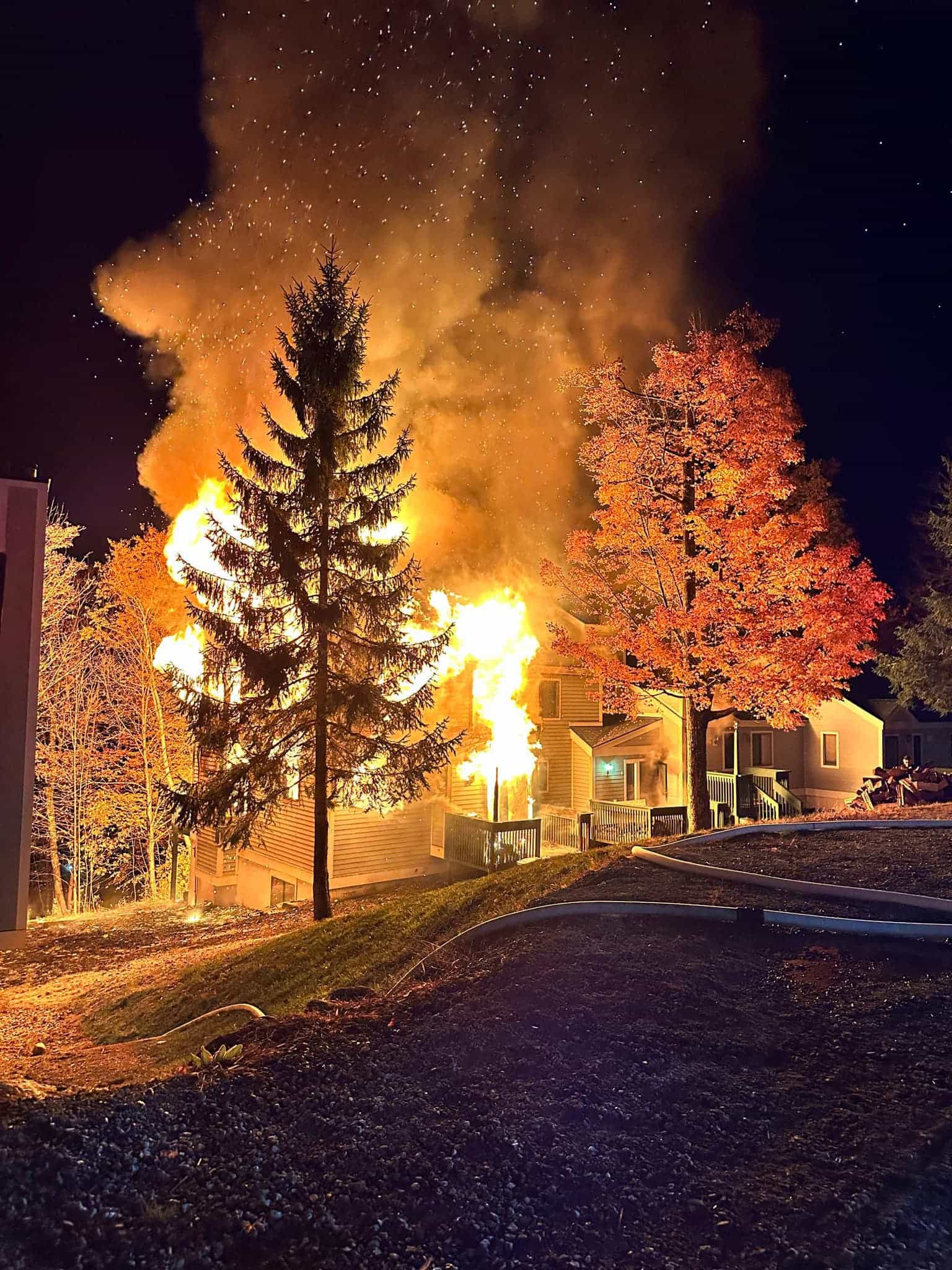 condo building on fire during the night at ski resort