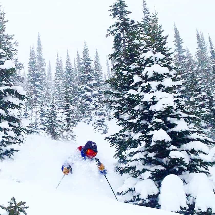 skier getting facehot in deep powder having already done his avalanche forecasting