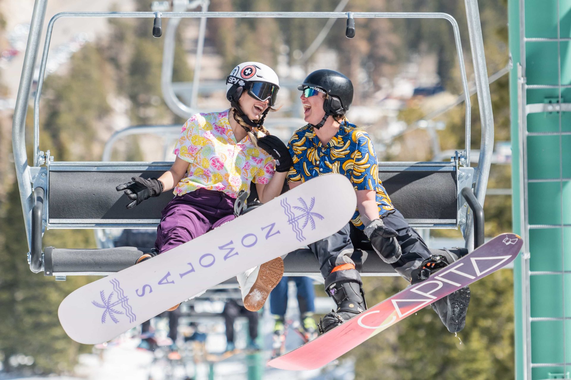 snowboarders on lift at Lee Canyon Resort in Nevada