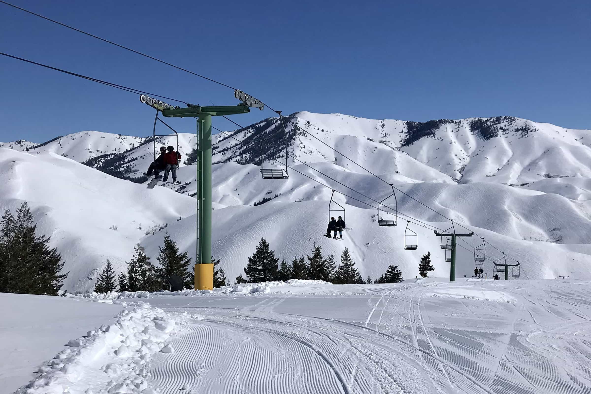 chairlift at soldier mountain Idaho, Soldier Mountain partners with U.S. Ski & Snowboard to host slopestyle training camps for elite snowboard and freeski teams in Idaho.