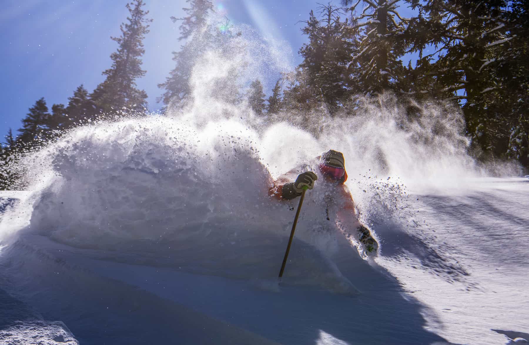 skier in waist deep snow powder